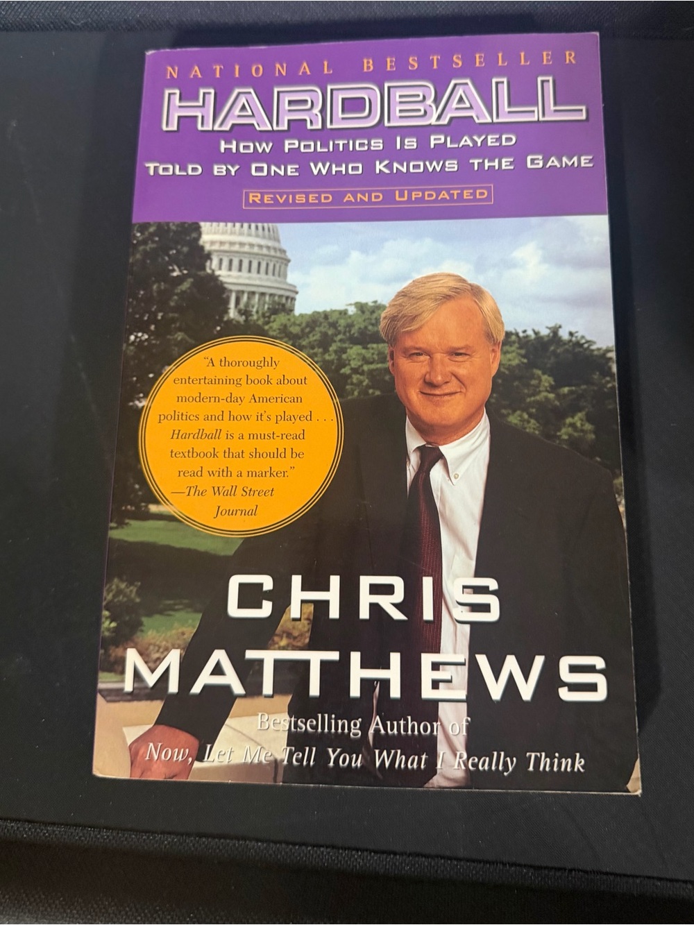 Amazon Paperback Book with Purple Cover and Yellow Accent